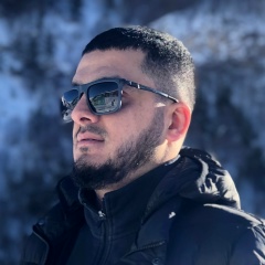 Адам Алиев