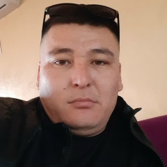 Азамат Искаков