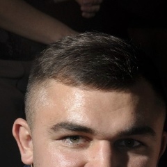 Роман Мисливец