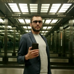 Роман Хугати