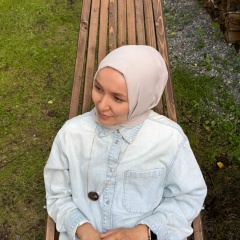 Айгуль Костюк, Tutong